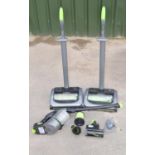 Two Gtech AirRam upright vacuum cleaners and a Gtech Multi portable cleaner, with attachments