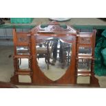 Victorian walnut over mantle, shaped cornice above central shield shaped mirror plate with four