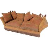 Country house Knole type sofa, upholstered in Renaissance chenille with pineapple finials, rope