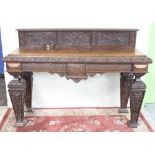 Victorian Jacobeathan revival oak side table, raised back carved with scrolls and foliage, on square