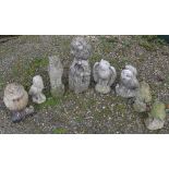 Eight reconstituted stone owl garden ornaments