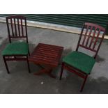 Two outdoor folding chairs and a folding occasional table (3)