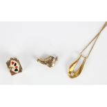 9ct gold charm of playing cards case with miniature cards inside, a 9ct gold boot charm and a 9ct