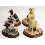 Margaret Turner Border Fine Arts models: two seated Labradors, H25cm, spaniel and pups, H20cm, and a