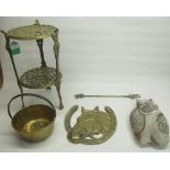 C20th brass jardinière stand with pierced gallery and lion mask handles, on three paw feet, late