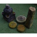 Three sandstone plinth stands, a sandstone column and a reconstituted salt glazed strawberry planter