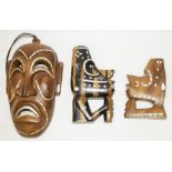 Solomon Islands: two late 20th century musu musu or nguzunguzu canoe prows, carved wood heads with