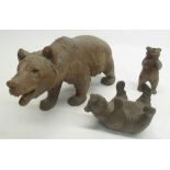 C20th carved Black Forest bear, and two smaller bears H11.5cm max (3)