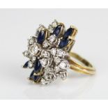 18ct yellow gold diamond and sapphire cluster ring set with brilliant cut diamonds and marquise