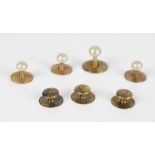 Three Edwardian 15ct gold and chip diamond button studs, 2.0g, together with four other base metal