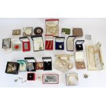 Collection of costume jewellery pendants, brooches, simulated pearls etc. together with lighters and