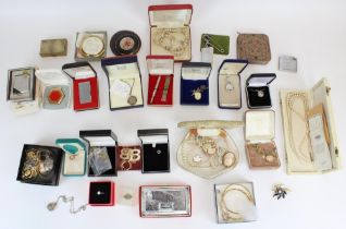 Collection of costume jewellery pendants, brooches, simulated pearls etc. together with lighters and