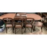 Georgian style mahogany twin pillar extending dining table, W284cm D106 H77cm max and a set of 4