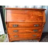 Edwardian walnut bureau with fall front above three drawers with Art Nouveau cast handles, W100cm