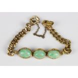 Yellow metal and Jade trilogy bracelet, the Moss in Snow Jadeite cabochons set in yellow metal
