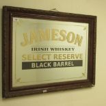 Reproduction Jameson Irish Whiskey advertising mirror in gilt frame, 47cm x 64cm