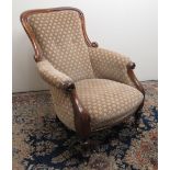 Victorian mahogany framed upholstered arm chair, on turned supports