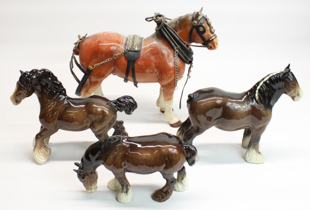 Beswick grazing shire #1050, Melba Ware heavy horse with harness, H28.5cm, and two similar