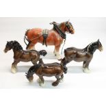 Beswick grazing shire #1050, Melba Ware heavy horse with harness, H28.5cm, and two similar