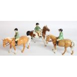 Beswick Boy on Palomino Pony model 1500 (2) and a Girl on Skewbald Pony model 1499