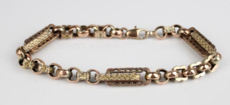 Yellow metal belcher chain bracelet with intersecting rectangular links, the clasp stamped 9ct,
