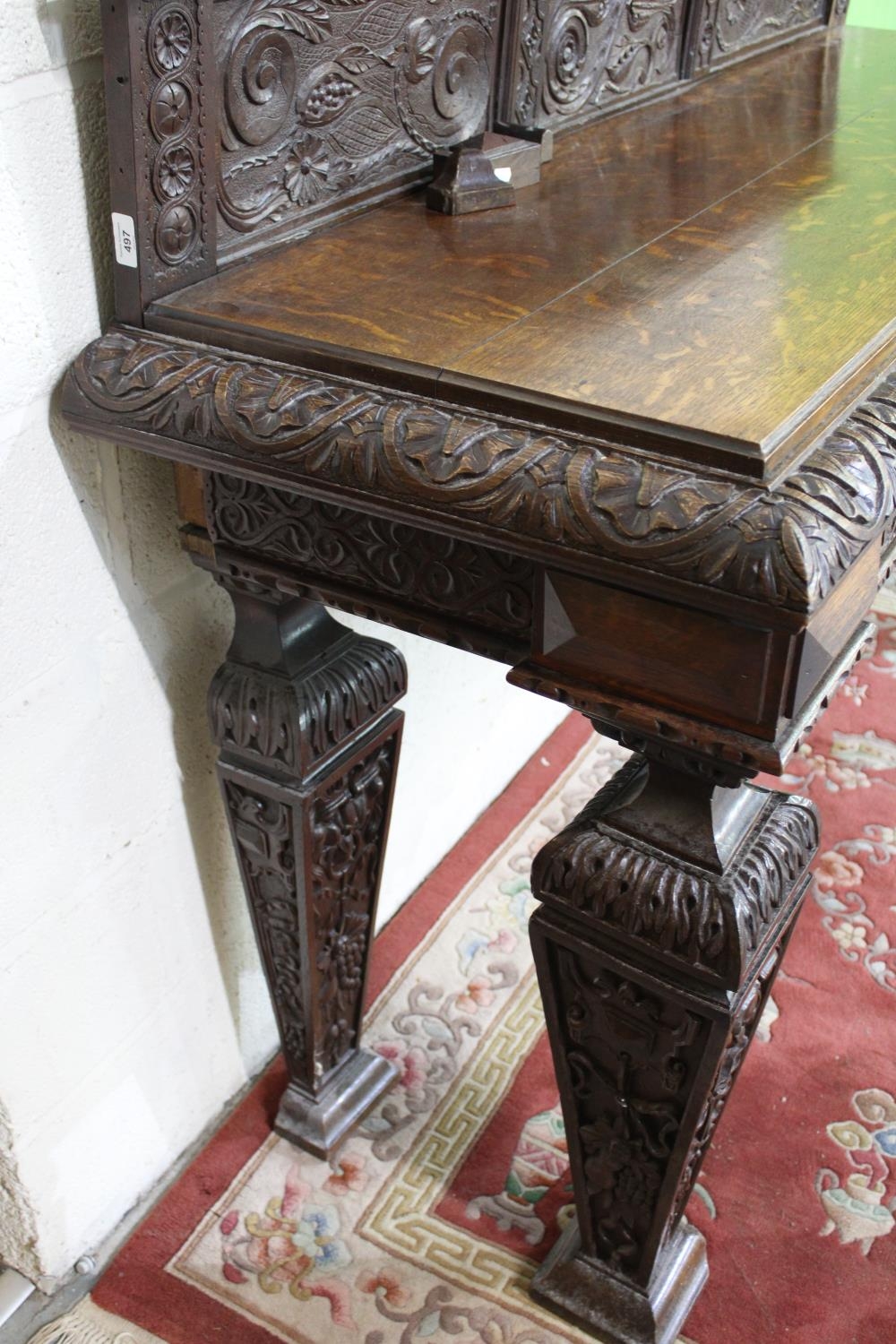 Victorian Jacobeathan revival oak side table, raised back carved with scrolls and foliage, on square - Image 3 of 4