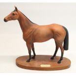 Royal Doulton model of racehorse Red Rum, on wooden plinth, H32cm