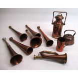 Six early C20th and later copper hunting horns, max L23.5cm, miniature copper and brass bugle,