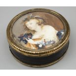 Early C19th tortoiseshell circular trinket box with gilt metal mount, set with portrait miniature of
