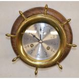 Schatz "Ships Bell" brass cased bulk head type clock in the form of a ships wheel, signed silvered