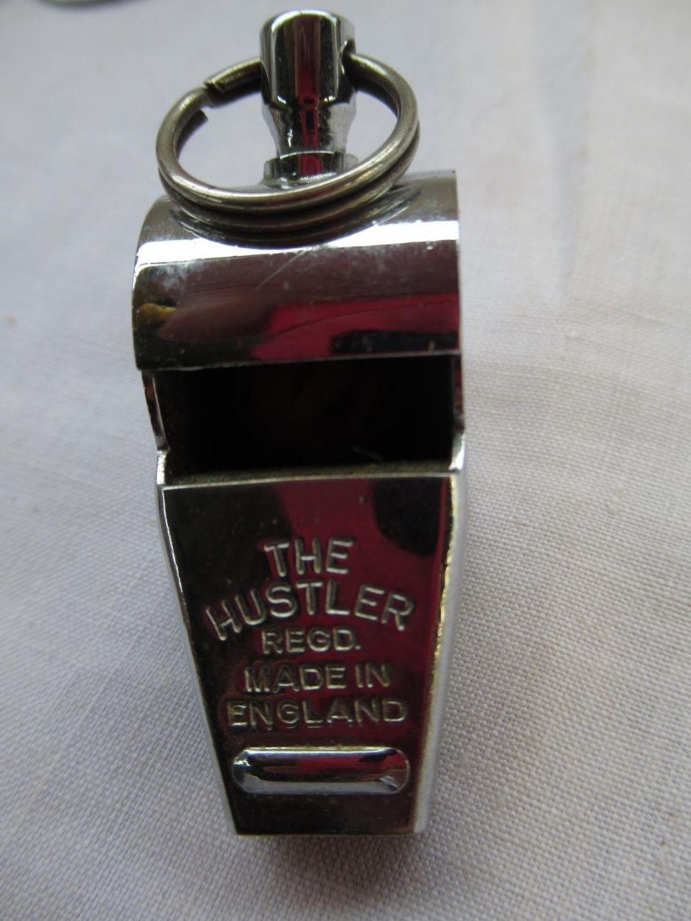 J. Hudson ARP whistle, The Hustler whistle, a coin carrier, a collection of Bus related badges incl. - Image 3 of 4