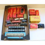 Boxed Tri-ang Railways rolling stock, accessories including signal box, engine shed, speed control