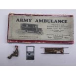 W. Britain military model No. 1512 Army Ambulance with Driver and Wounded Man on Stretcher, in