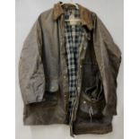 Gents Barbour Solway Zipper waxed jacket with green tartan lining, detachable hood and belt