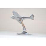 Vintage WW2 era chrome plated brass Fairey Battle aircraft model with stand (model secure but