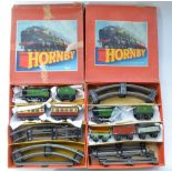 Two boxed Hornby O gauge clockwork train sets, passenger and goods, both with 0-4-0 45746 locos