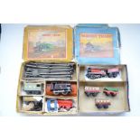 Two boxed vintage Hornby clockwork train sets to include 2x 0-4-0 locos, BR black Type 40 (in