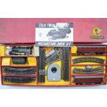 Three OO gauge Trix 3 rail electric steam train train sets, incomplete, A/F. Please refer to