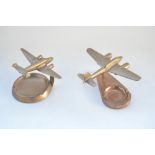 Pair of vintage wartime era solid cast metal model aircraft ashtrays, one Lockheed Hudson, the other