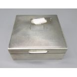 Geo.VI hallmarked Sterling silver cigarette box with lined interior, engine turned detail to lid, by