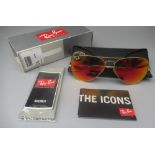Pair of Ray-Ban Aviator sunglasses with mirror lenses, in black case with unopened wipe, leaflets