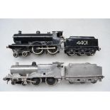 Two vintage O gauge Bassett Lowke 4-4-0 clockwork steam locomotives with tenders, one repainted