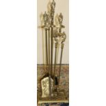 Rococo style brass fireside companion stand with four implements, H76cm