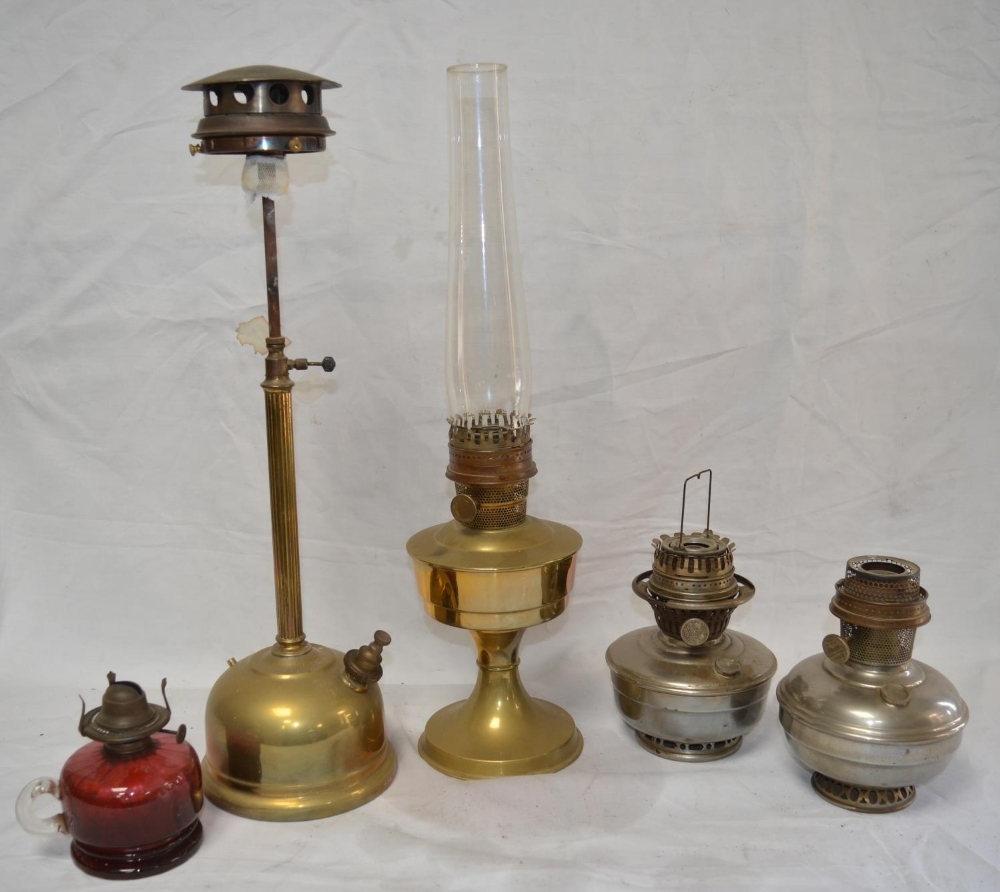 Five vintage oil lamps, some incomplete, no manufacturers marks