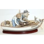 Lladro group, 'Fishing with Gramps' #5215, L39cm, with wooden plinth