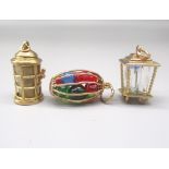Three 9ct yellow gold charms including two lanterns and another similar filled with coloured