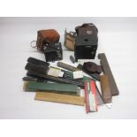 Kodak No.2A Brownite camera, Kodak Brownie Six-20 Model D Camera, collection of slide rules, cut
