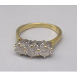 18ct yellow gold three stone diamond ring, set with clear stones stamped 750, size L1/2, 3.6g
