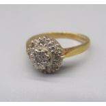18ct yellow gold illusion set diamond cluster ring, stamped 18, size M, 3.1g