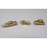 Three 9ct yellow gold car charms, all stamped 375, gross 12.6g